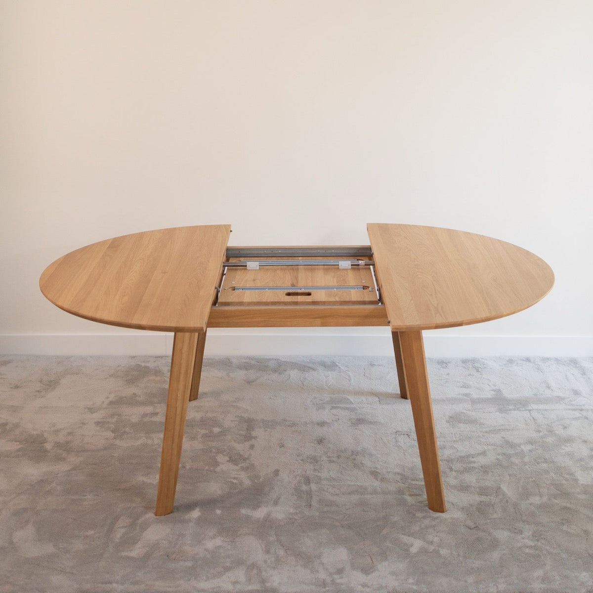 Mesa de comedor de madera maciza de Roble redonda extensible Saga | VESKOR